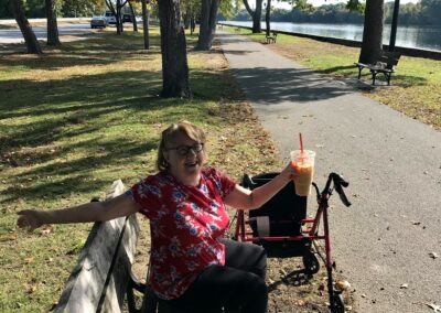 Woman Enjoying Coffee In The Park Small View