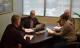 Staff meeting of our Associates at our Elbow Drive location featuring just a few of our Registered Psychologists, Registered Christian Counsellors, Certified Professional Counsellors and Pre-Licensed professionals seated at our boardroom table.