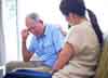 Therapist comforting a trauma victim struggling with grief, loss and bereavement.